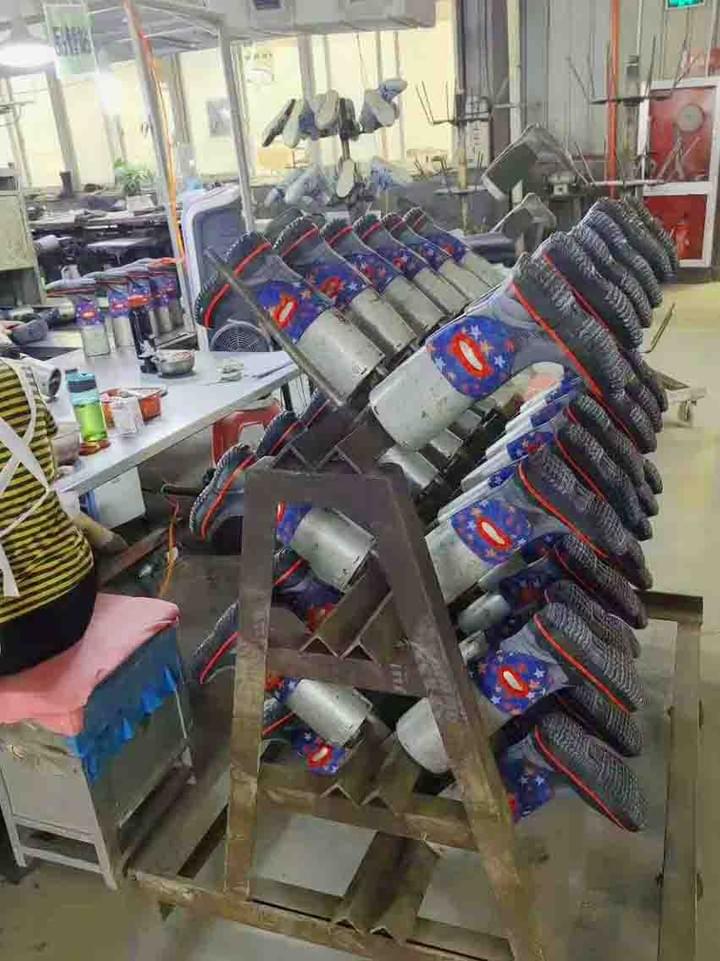 gumboots in workshop during manufacturing gumboots in workshop during manufacturing