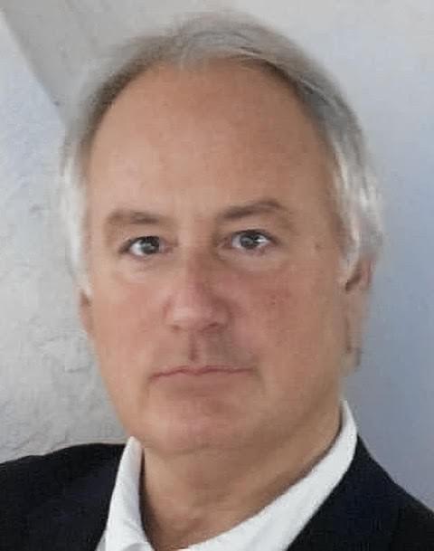 Photograph of Tom Aposporos by Thomas Aposporos, II. Original phtograph is black and white with color added by Don Walker. Photograph of Tom Aposporos by Thomas Aposporos, II. Original phtograph is black and white with color added by Don Walker.