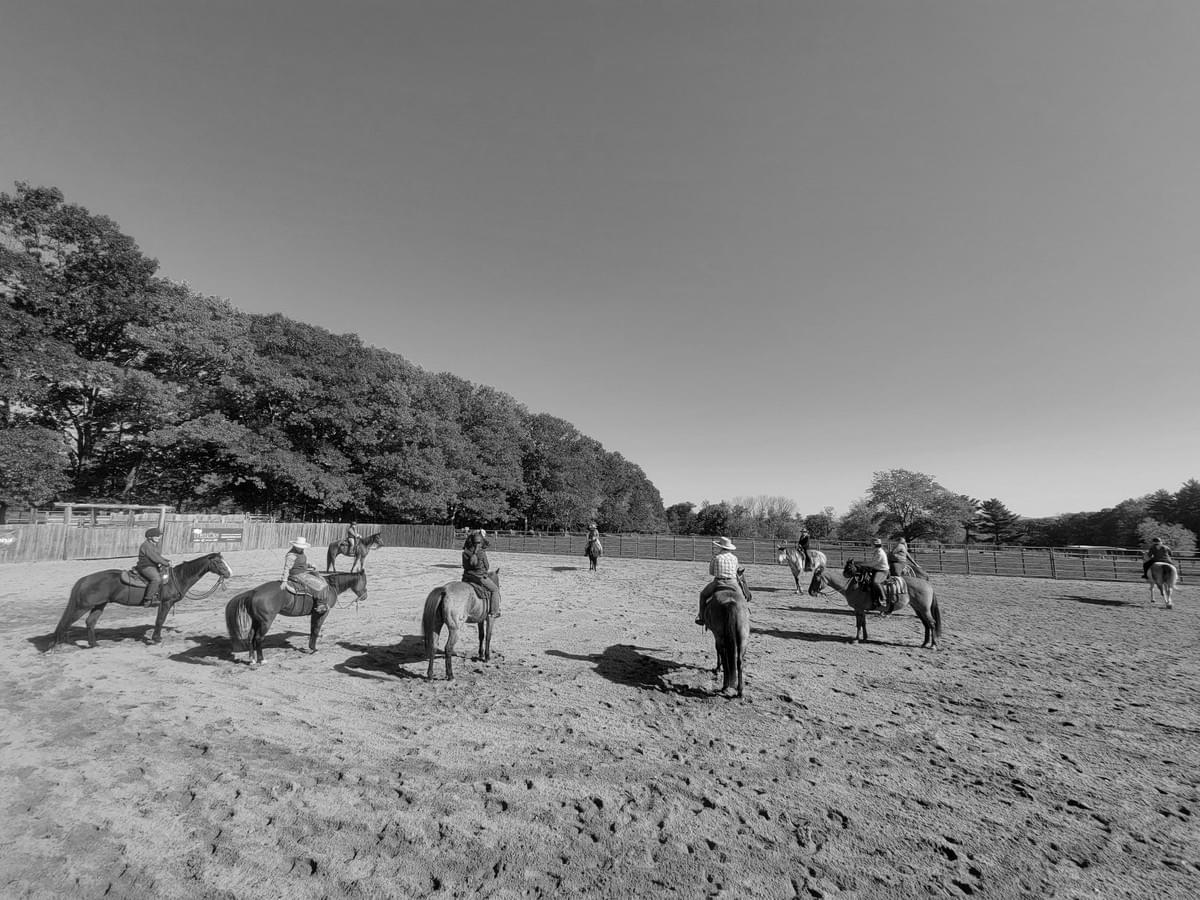 Circle of western riders on horseback  Circle of western riders on horseback