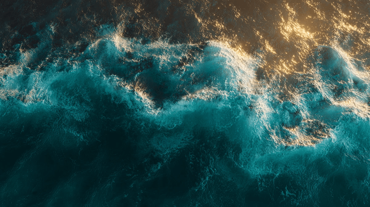 Abstract gold light dissolving into teal ocean water, symbolizing emotional release during burnout recovery Abstract gold light dissolving into teal ocean water, symbolizing emotional release during burnout recovery