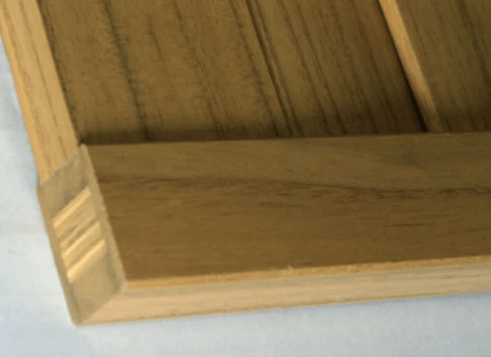 Close up of the reinforced wider stile use to stop solid panel shutters from warping and twisting. Close up of the reinforced wider stile use to stop solid panel shutters from warping and twisting.