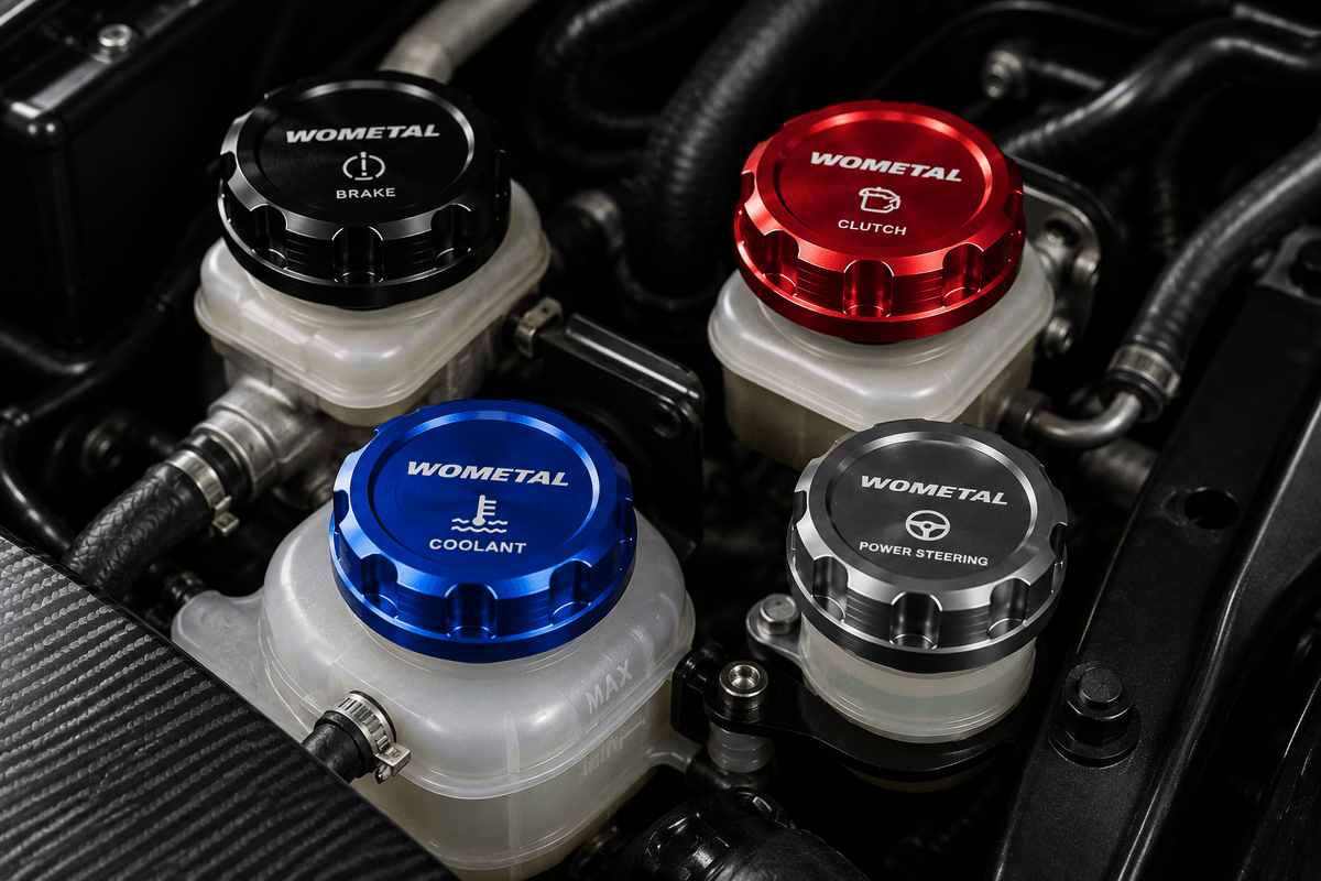 Billet aluminum reservoir caps installed on brake clutch coolant and power steering systems in a high performance vehicle engine bay Billet aluminum reservoir caps installed on brake clutch coolant and power steering systems in a high performance vehicle engine bay