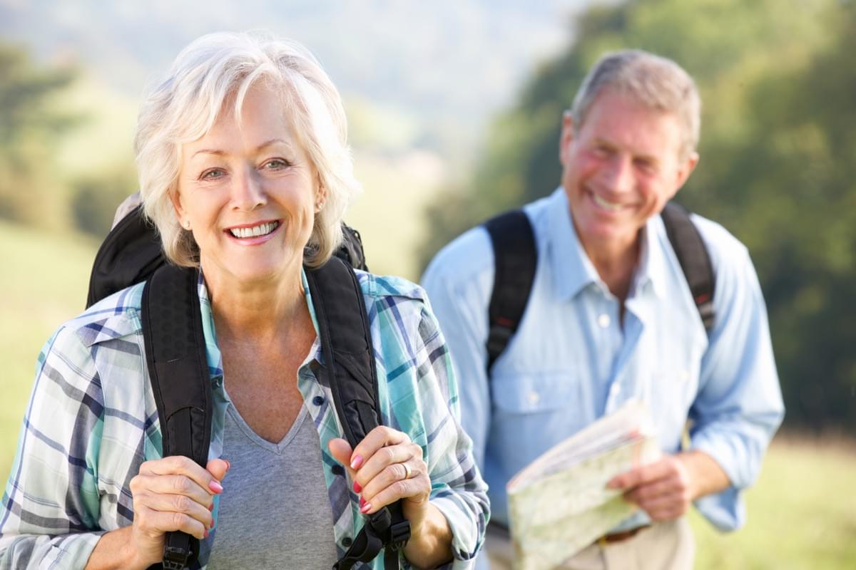 Happy Senior Couple Hiking Experiencing Pain Relief from Compounded Pain Medications Happy Senior Couple Hiking Experiencing Pain Relief from Compounded Pain Medications