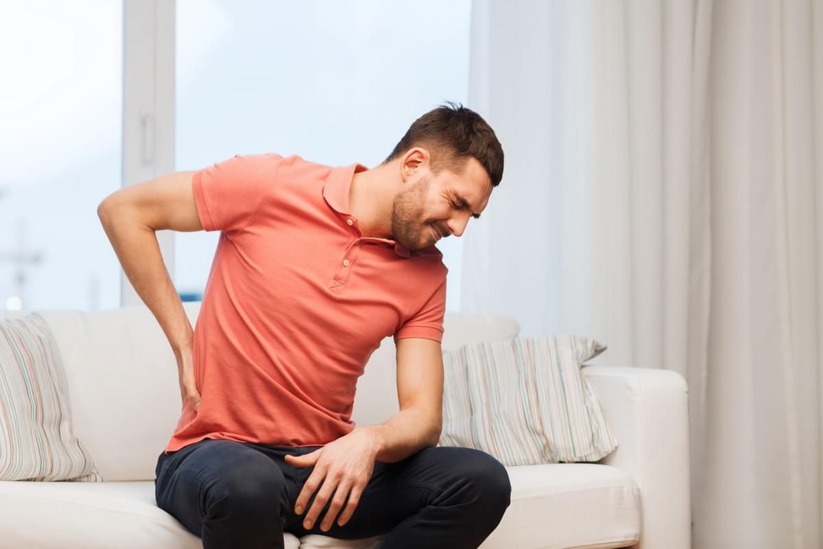 Middle Aged Man Suffering from Low Back Pain Middle Aged Man Suffering from Low Back Pain