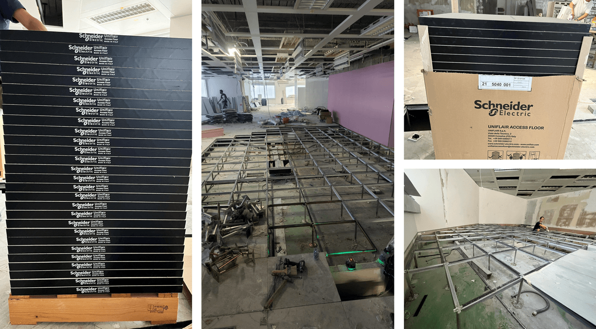 Reinstatement work in progress, Stacked Schneider Uniflair access-floor panels and raised-floor grid being installed across office Reinstatement work in progress, Stacked Schneider Uniflair access-floor panels and raised-floor grid being installed across office