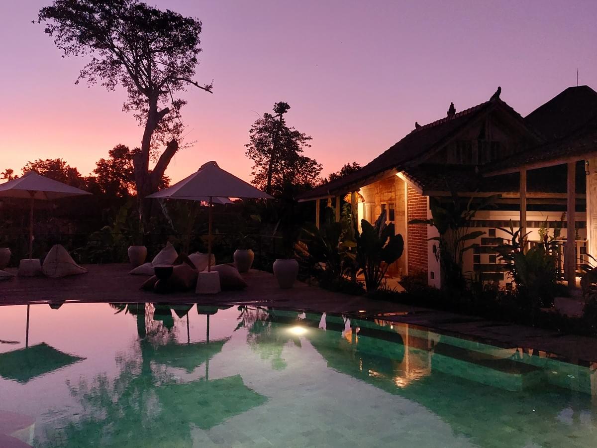 Reflections on the tranquil swimming pool at Spaces Bali Reflections on the tranquil swimming pool at Spaces Bali
