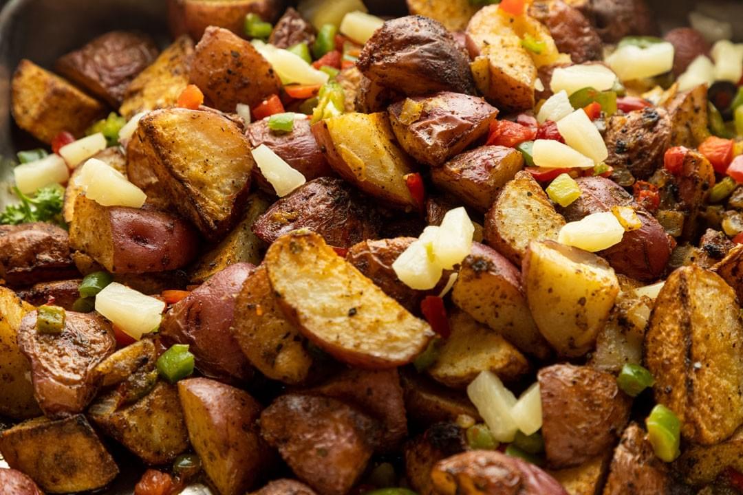 roasted potatoes with chopped vegetables roasted potatoes with chopped vegetables