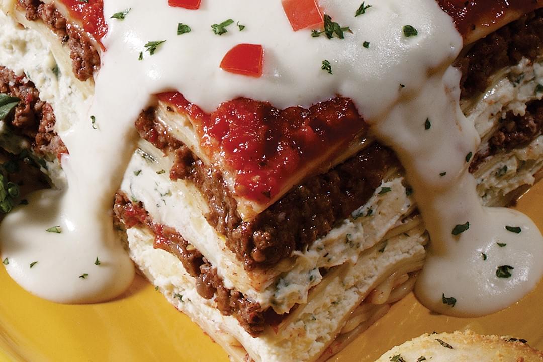 plated lasagna with sauce plated lasagna with sauce