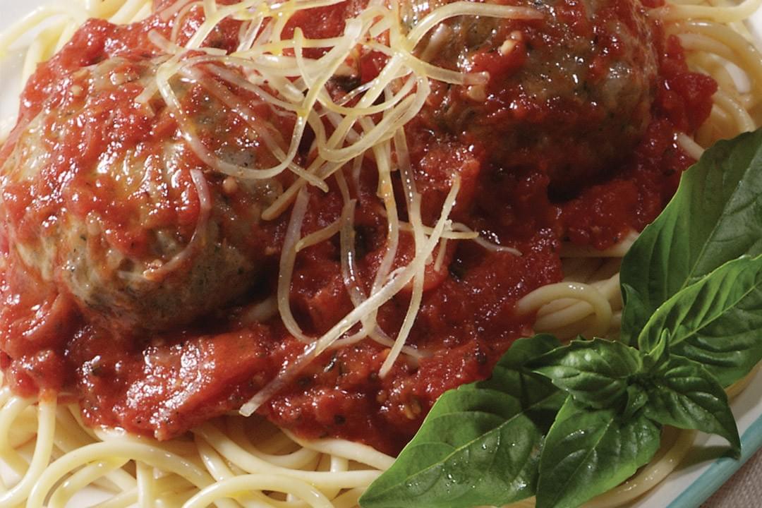 spaghetti and meatballs in sauce and garnish spaghetti and meatballs in sauce and garnish
