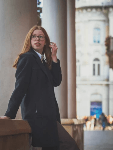 Girl in uniform outside school to represent all girls who face discrimination and Teach Well Toolkit's survey to find out about discrimination in your school Girl in uniform outside school to represent all girls who face discrimination and Teach Well Toolkit's survey to find out about discrimination in your school