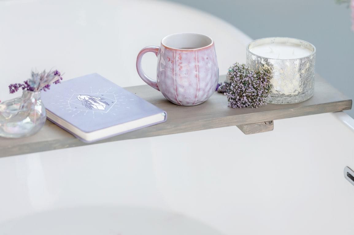 cozy self care with journal, tea, flowers and candle cozy self care with journal, tea, flowers and candle