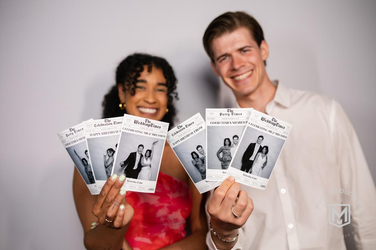 Newspaper Headlines Experience photobooth by MUSG Productions with custom tabloid-style headlines and themed props for playful wedding receptions and milestone celebrations Newspaper Headlines Experience photobooth by MUSG Productions with custom tabloid-style headlines and themed props for playful wedding receptions and milestone celebrations