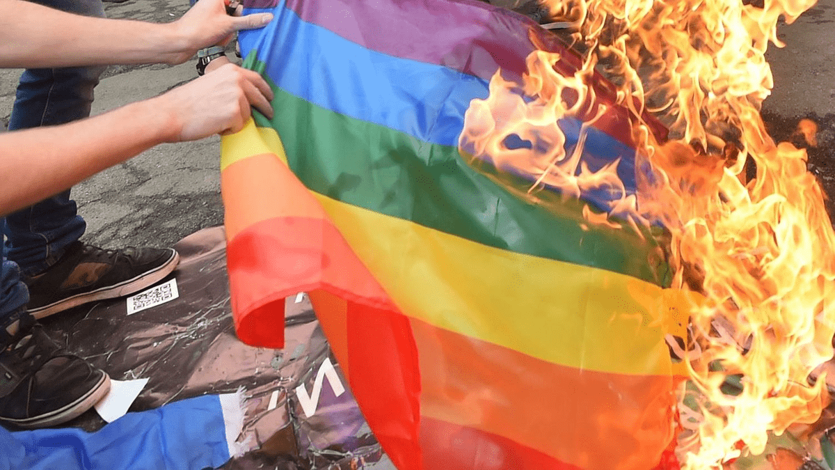 People Burning Gay Flag
