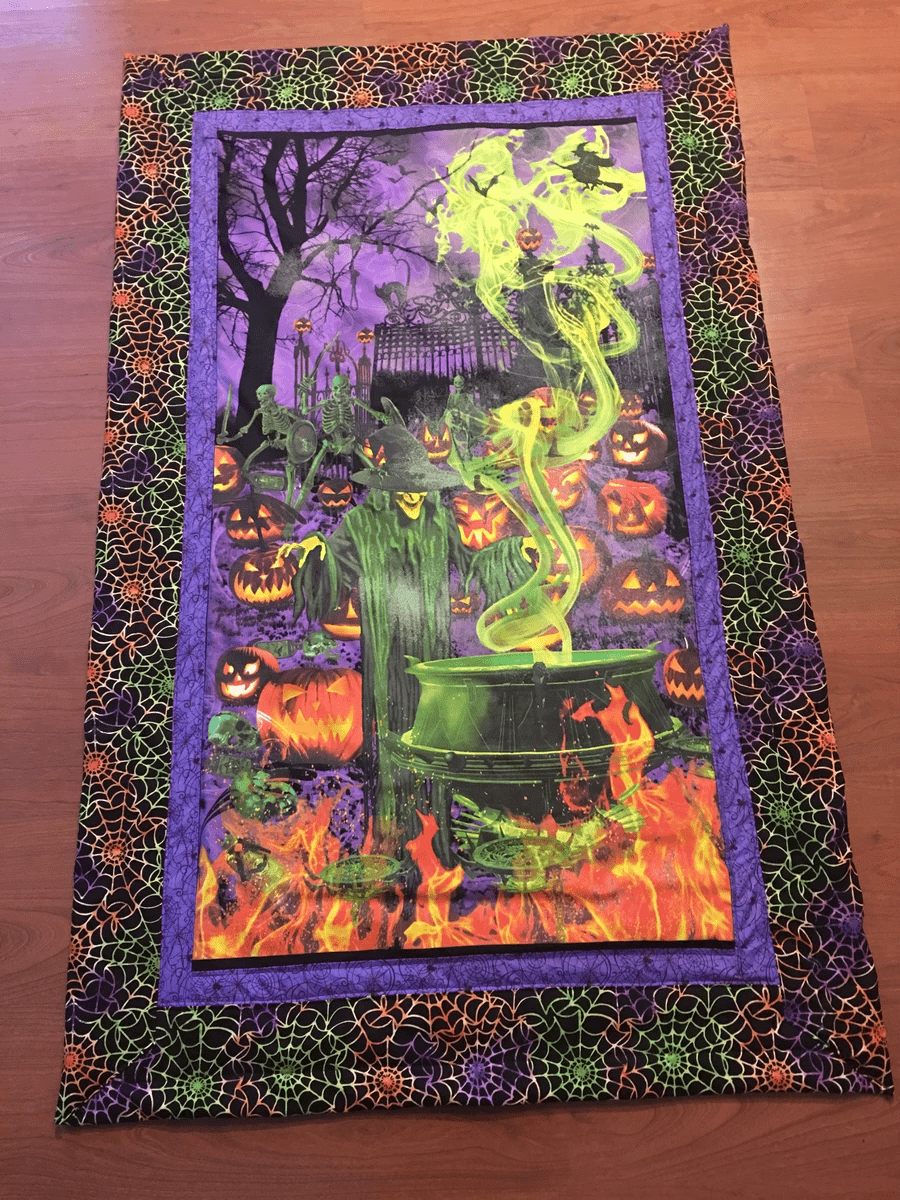Witch over cauldron, fabric panel bought from Quilter's Market, Tucson, AZ. Witch over cauldron, fabric panel bought from Quilter's Market, Tucson, AZ.