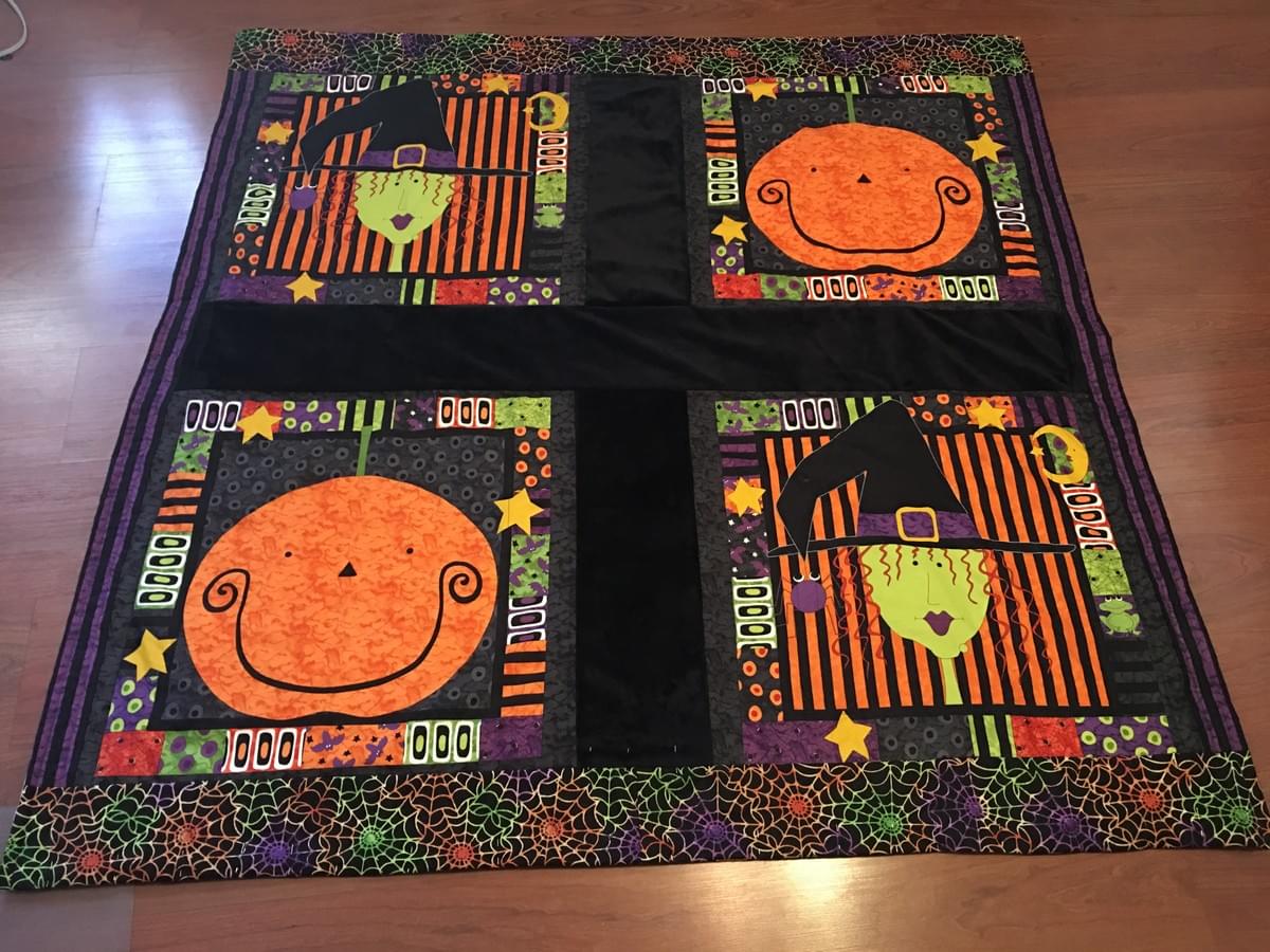 Happy witch and Pumpkin, fabric panels bought from Quilter's Market, Tucson, AZ. Happy witch and Pumpkin, fabric panels bought from Quilter's Market, Tucson, AZ.
