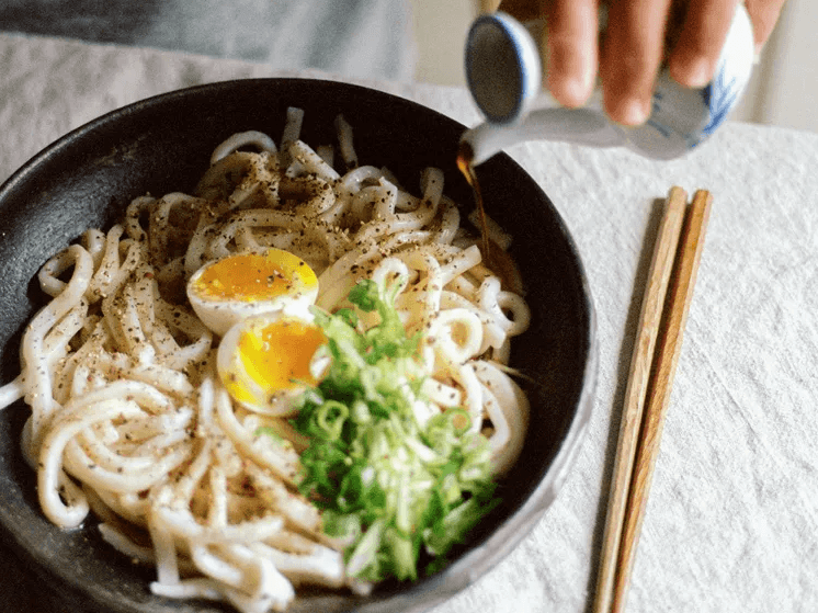 Life-Changing Udon with Soft-Boiled Egg, Hot Soy, and Black Pepper by Hetty McKinnon, Food & Wine Life-Changing Udon with Soft-Boiled Egg, Hot Soy, and Black Pepper by Hetty McKinnon, Food & Wine