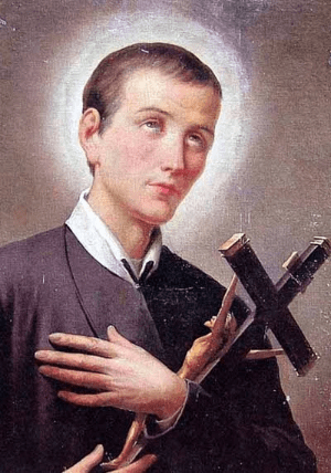 Saint Gerard Majella holding a crucifix and in prayer Saint Gerard Majella holding a crucifix and in prayer