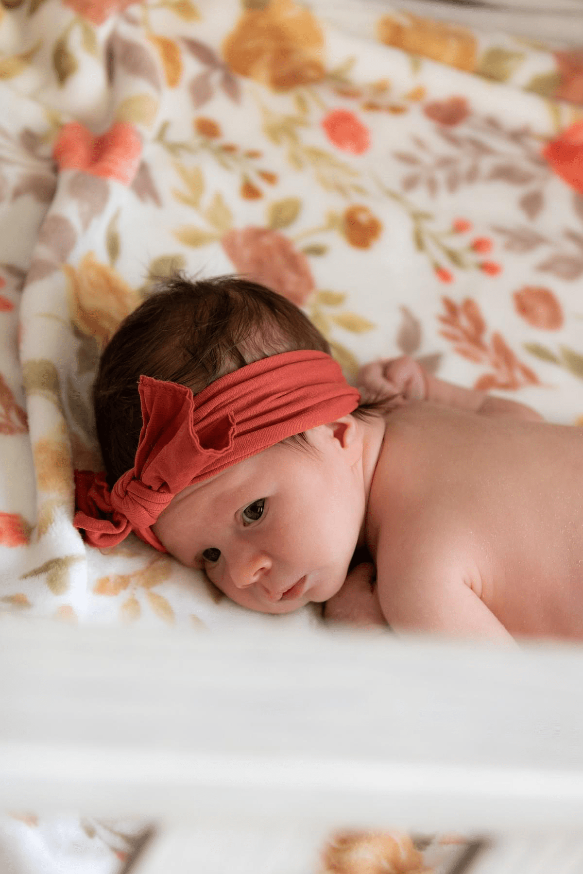 newborn in Las Vegas lays in baby crib newborn in Las Vegas lays in baby crib