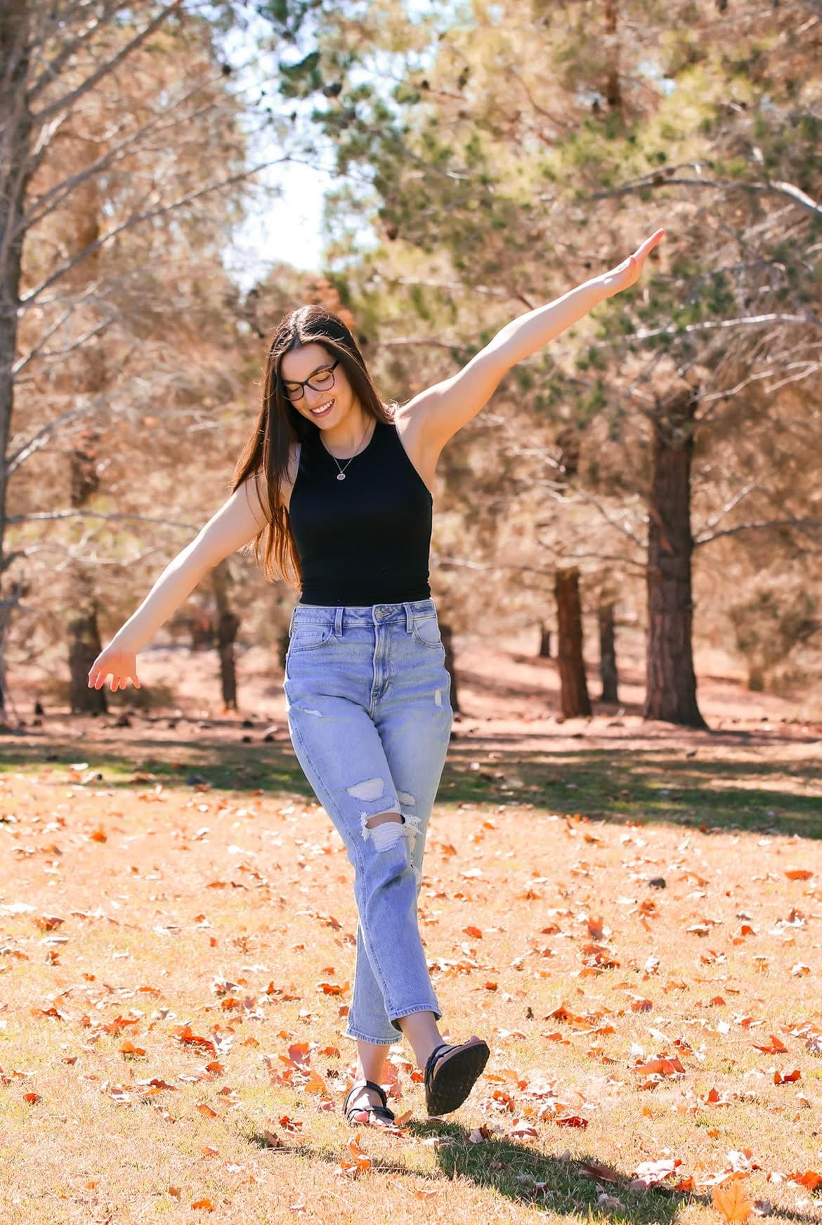 woman in Boulder City park during fall woman in Boulder City park during fall