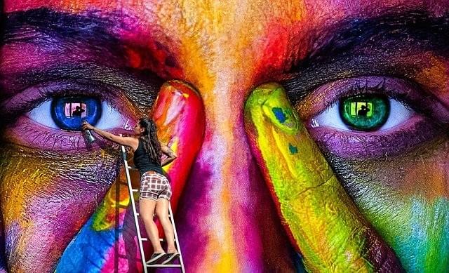 woman painting a photorealistic painted woman woman painting a photorealistic painted woman