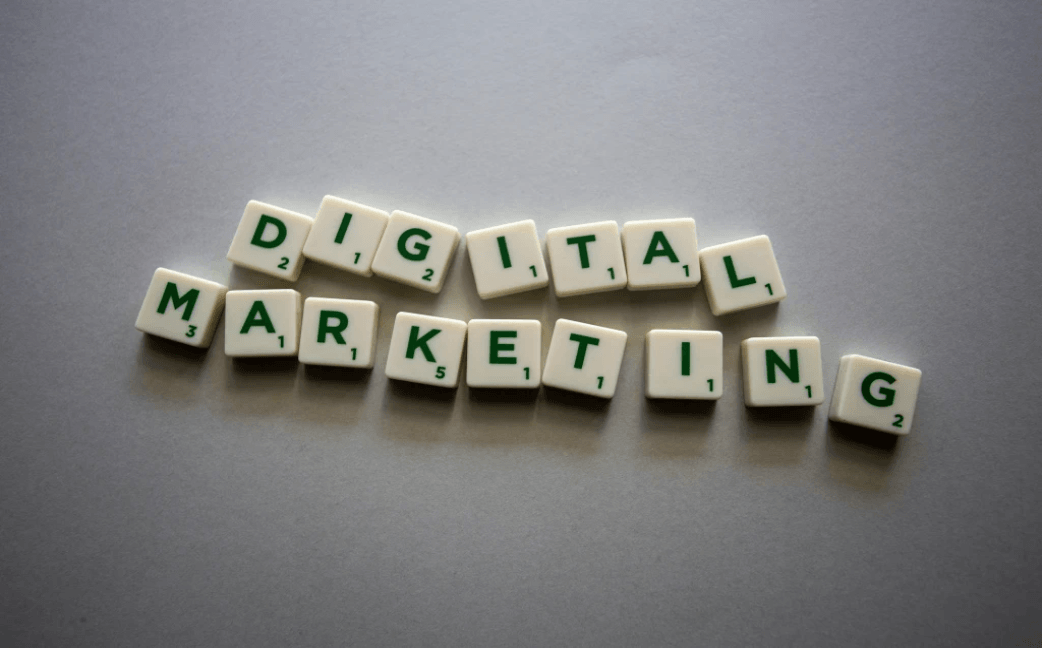 Scrabble tiles spelling out Digital Marketing with themes of content strategy and audience analysis Scrabble tiles spelling out Digital Marketing with themes of content strategy and audience analysis