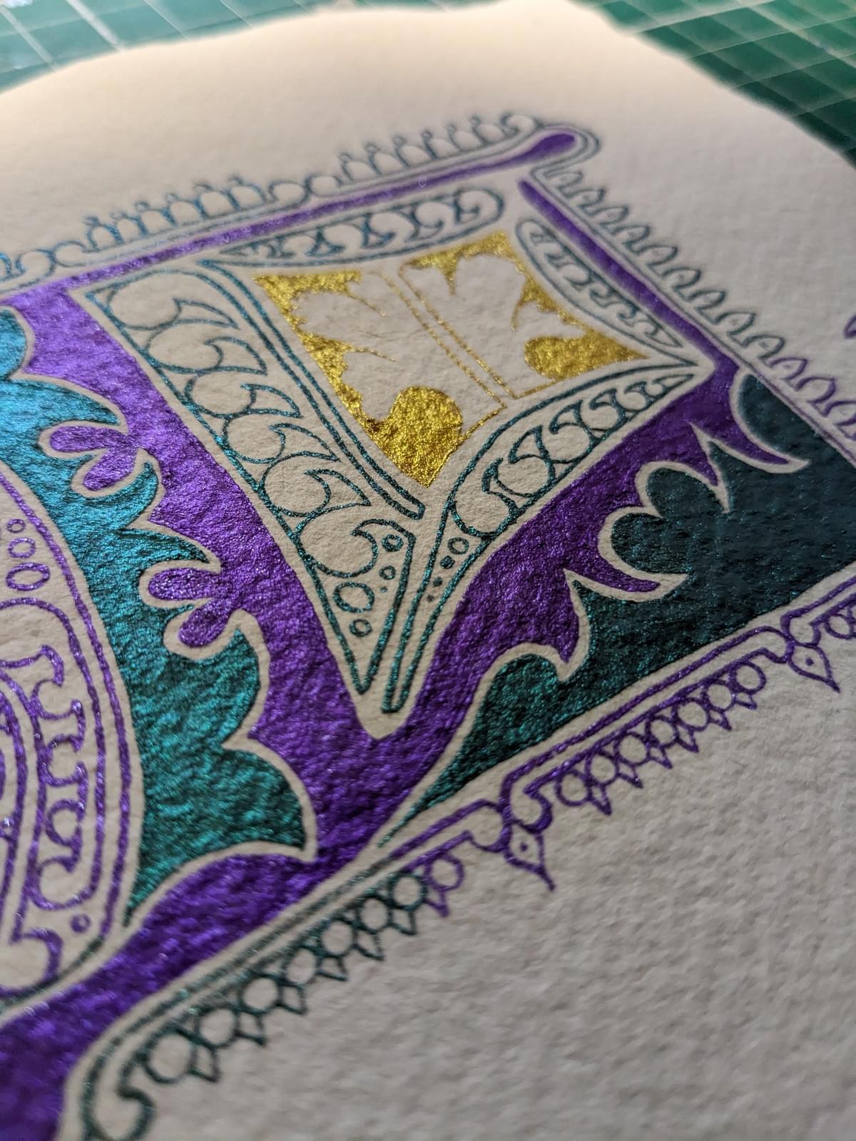 a modern take on a medieval versal. this L is it green, purple and gold with waves and vines. a modern take on a medieval versal. this L is it green, purple and gold with waves and vines.