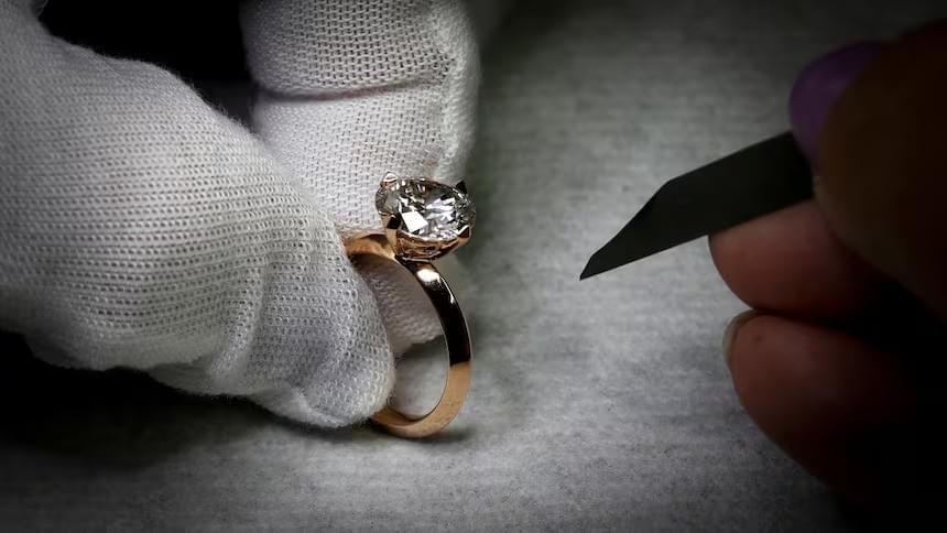 A quality control worker inspects a ring at the RFG Manufacturing Riviera jewelry design facility in Manhattan in New York City in 2021. Lab-grown diamonds have become more popular than natural ones since they came on the market in 2018. A quality control worker inspects a ring at the RFG Manufacturing Riviera jewelry design facility in Manhattan in New York City in 2021. Lab-grown diamonds have become more popular than natural ones since they came on the market in 2018.