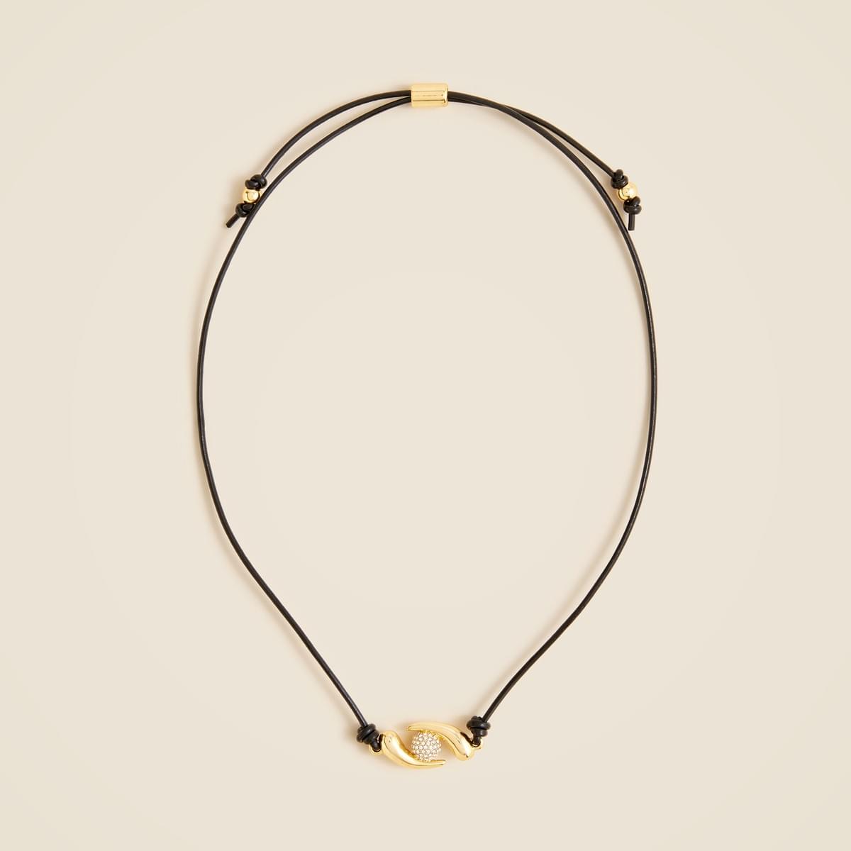 Khiry x J.Crew’s two-talon necklace with sculptural pavé crystal pendant has an adjustable-length leather cord ($89.50). Khiry x J.Crew’s two-talon necklace with sculptural pavé crystal pendant has an adjustable-length leather cord ($89.50).
