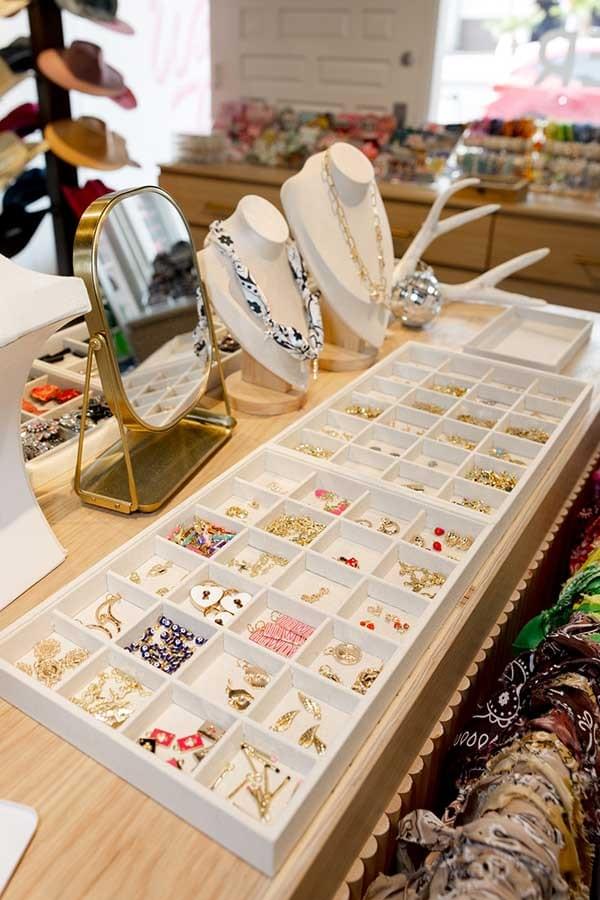 Customers can select from dozens of charms to add to their hat or to a bandana necklace at Rancher Hat Bar in-store or online. Customers can select from dozens of charms to add to their hat or to a bandana necklace at Rancher Hat Bar in-store or online.