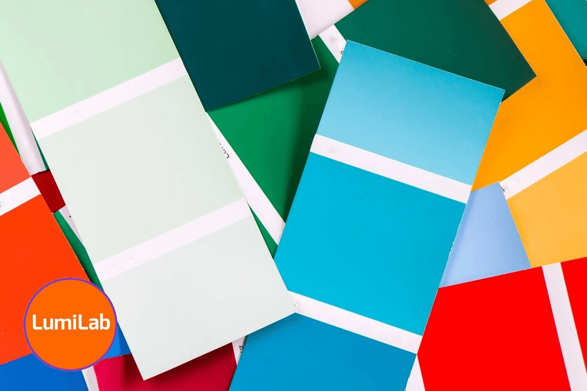 Assorted paint color swatches in various shades overlap each other. Assorted paint color swatches in various shades overlap each other.