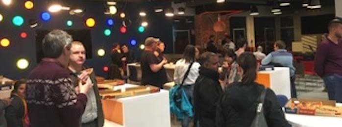 Cork AI Meetup 4 - Attendees enjoying the free pizza and beer Cork AI Meetup 4 - Attendees enjoying the free pizza and beer