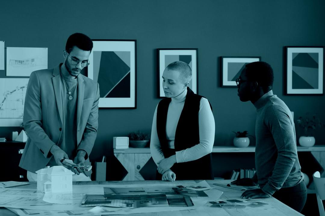 Designers staging and photographing a professional office interior Designers staging and photographing a professional office interior