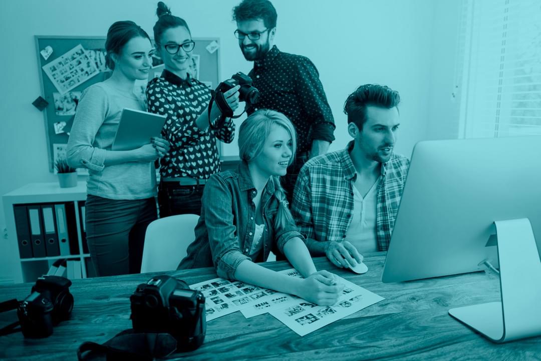 Creative team discussing interior visual assets and collaborating on a digital portfolio Creative team discussing interior visual assets and collaborating on a digital portfolio