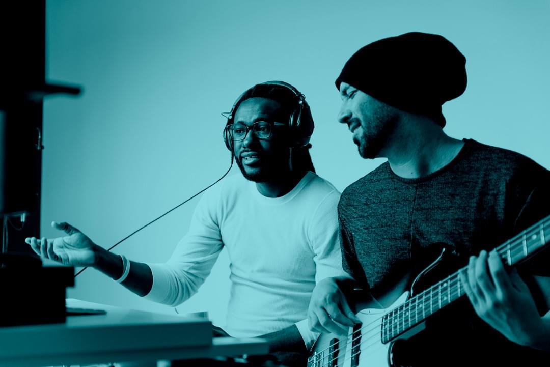 Team planning artist promotional strategies in a collaborative meeting Team planning artist promotional strategies in a collaborative meeting