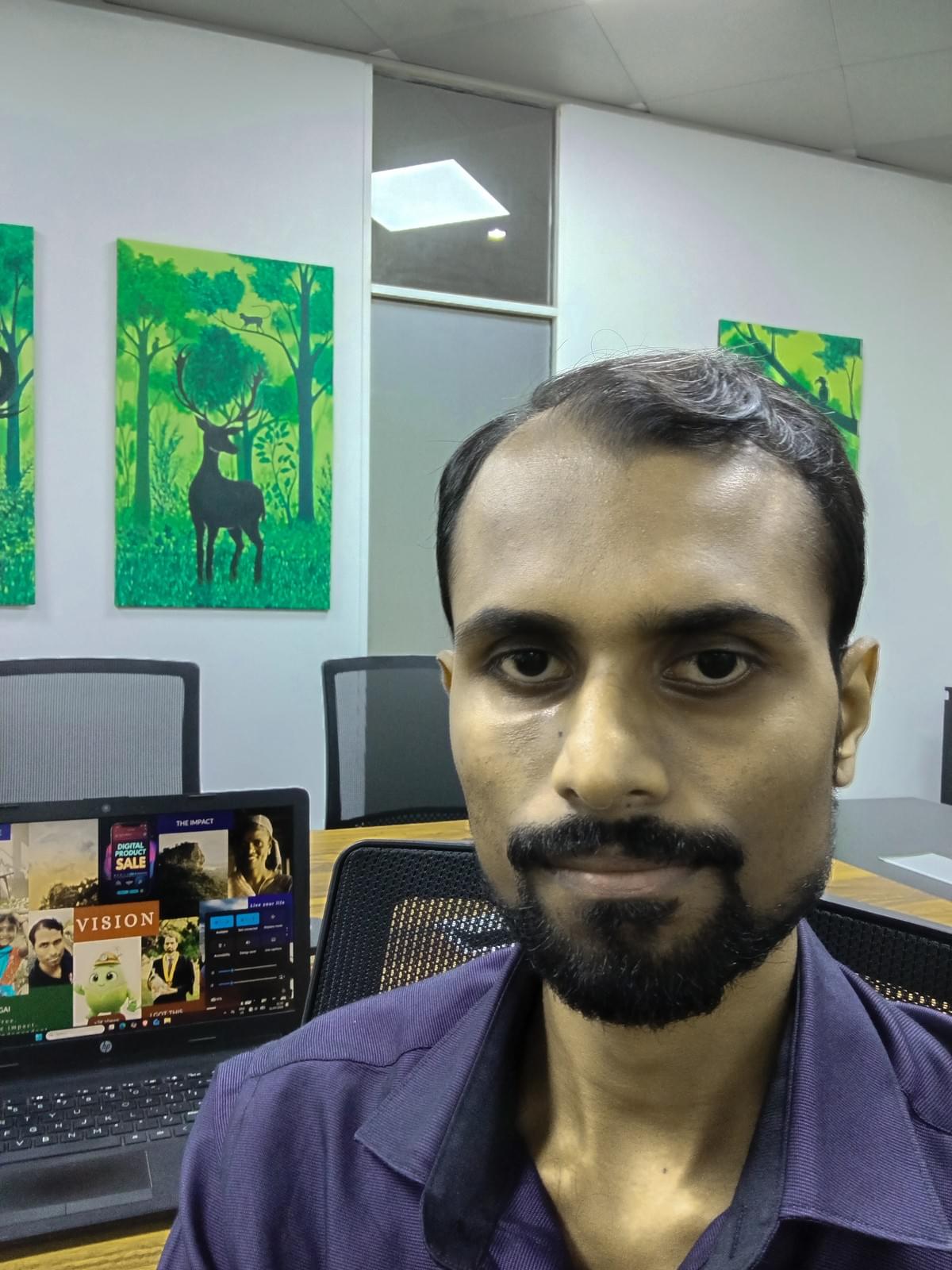 portrait shot of Sachintha at work in Greenpeace SA portrait shot of Sachintha at work in Greenpeace SA