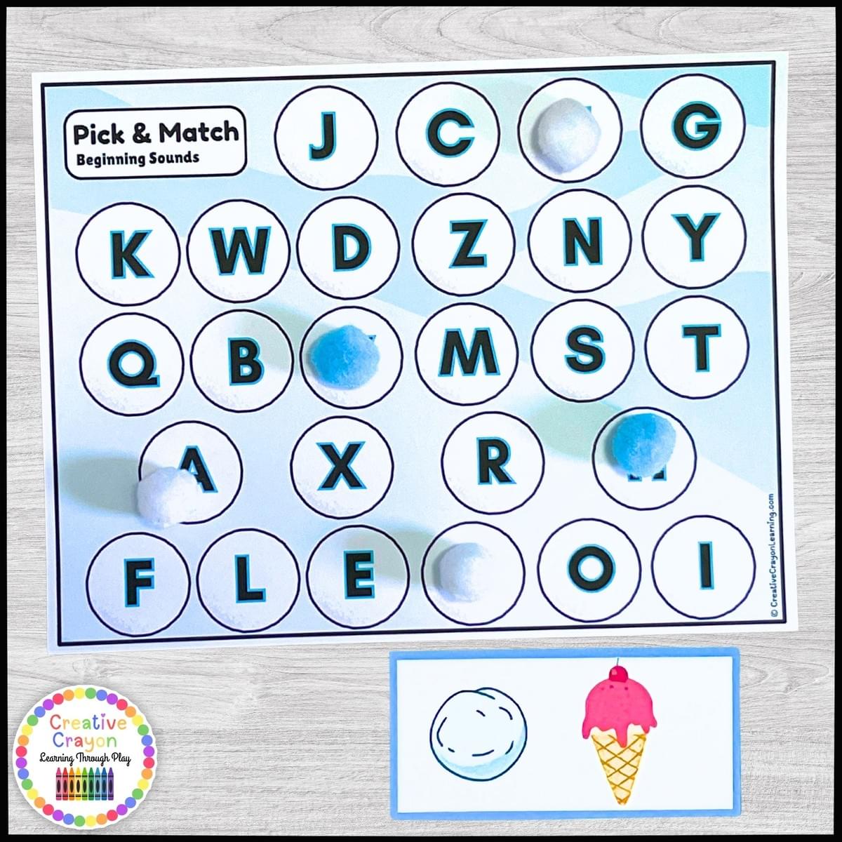 Kindergarten alphabet sound matching activity with plastic snowballs and picture mats for hands-on phonics practice Kindergarten alphabet sound matching activity with plastic snowballs and picture mats for hands-on phonics practice