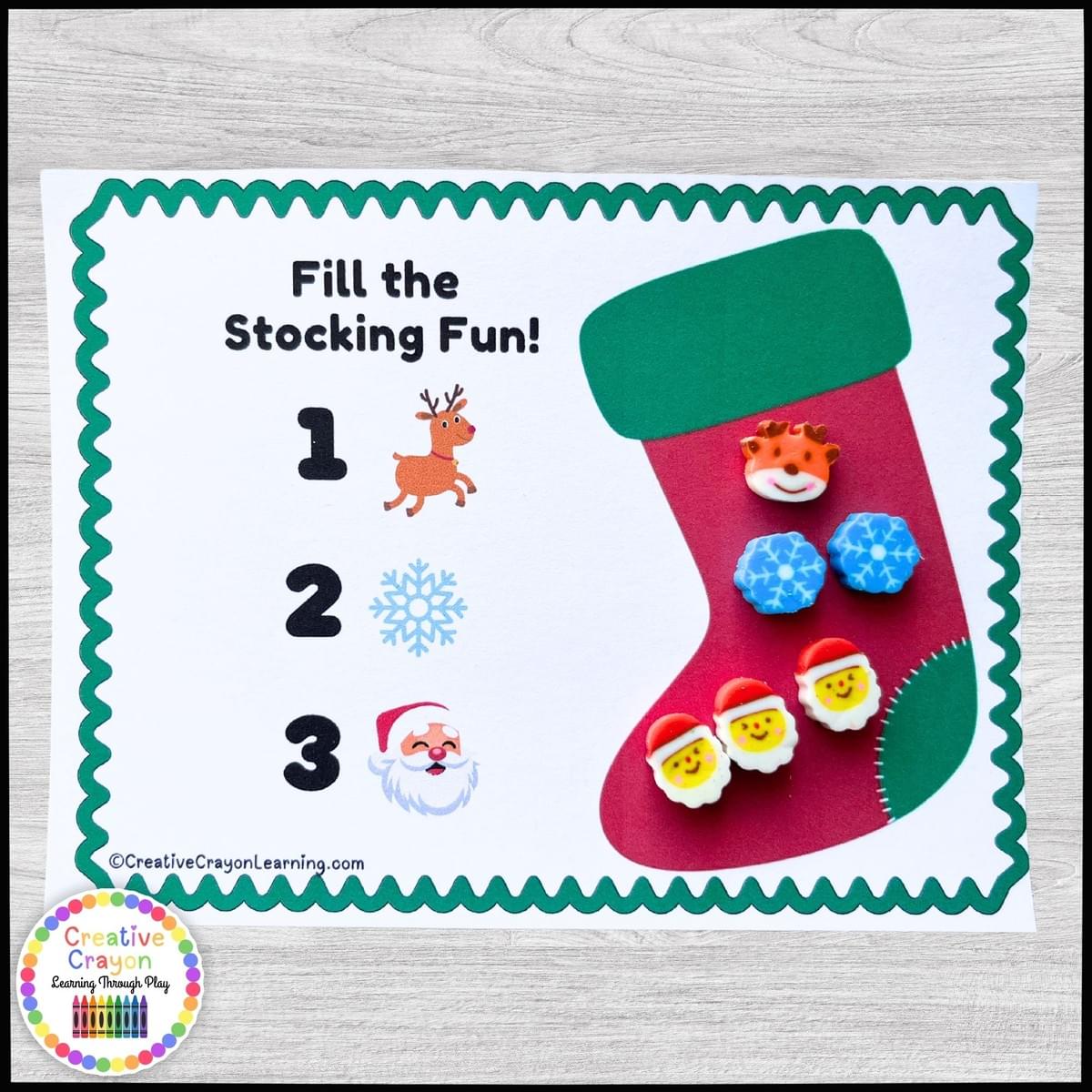 Kindergarten students engaging in a stocking-themed counting activity using mini erasers Kindergarten students engaging in a stocking-themed counting activity using mini erasers