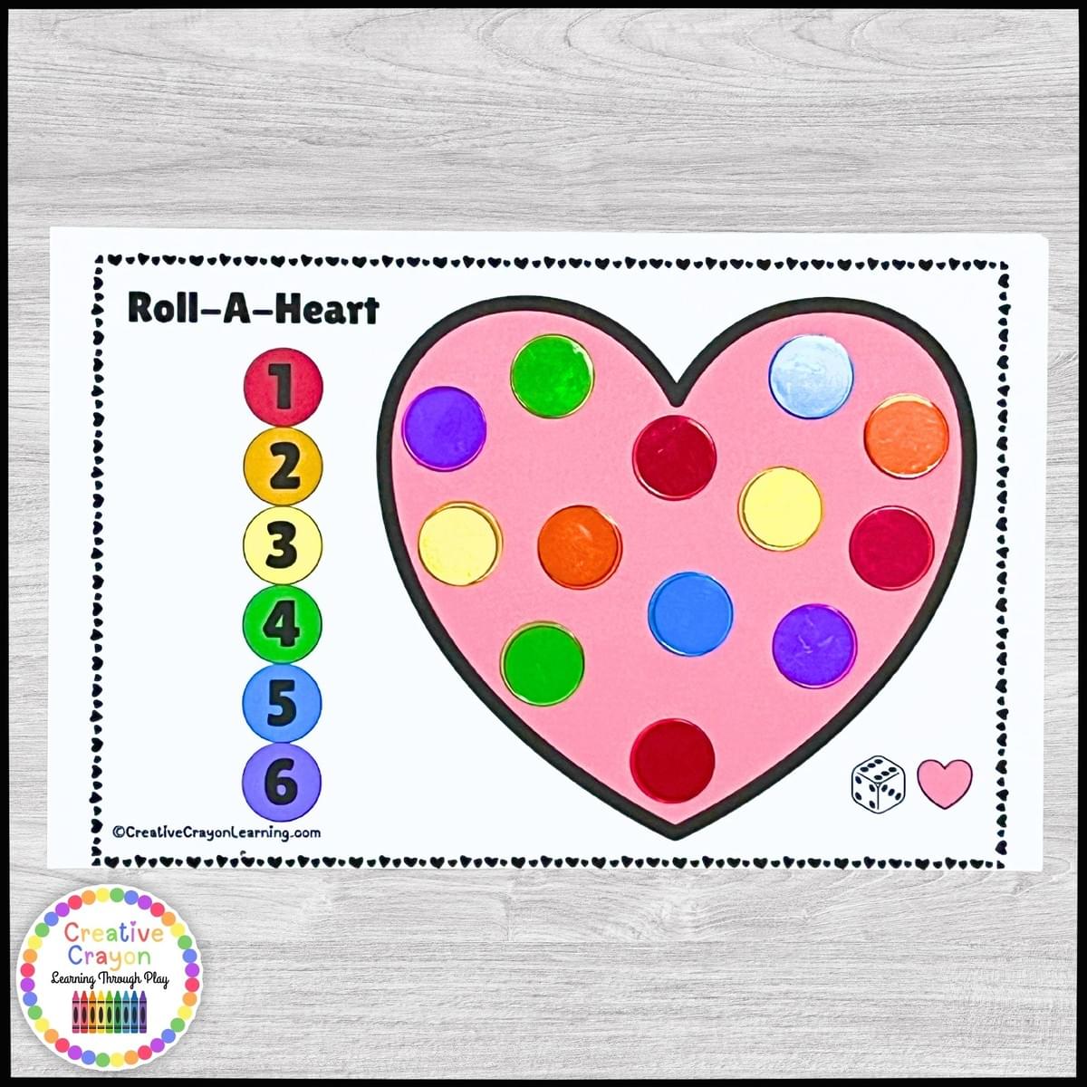 Kindergarten number recognition Valentine’s Day math game using dice and heart-themed cover-up mats. Kindergarten number recognition Valentine’s Day math game using dice and heart-themed cover-up mats.