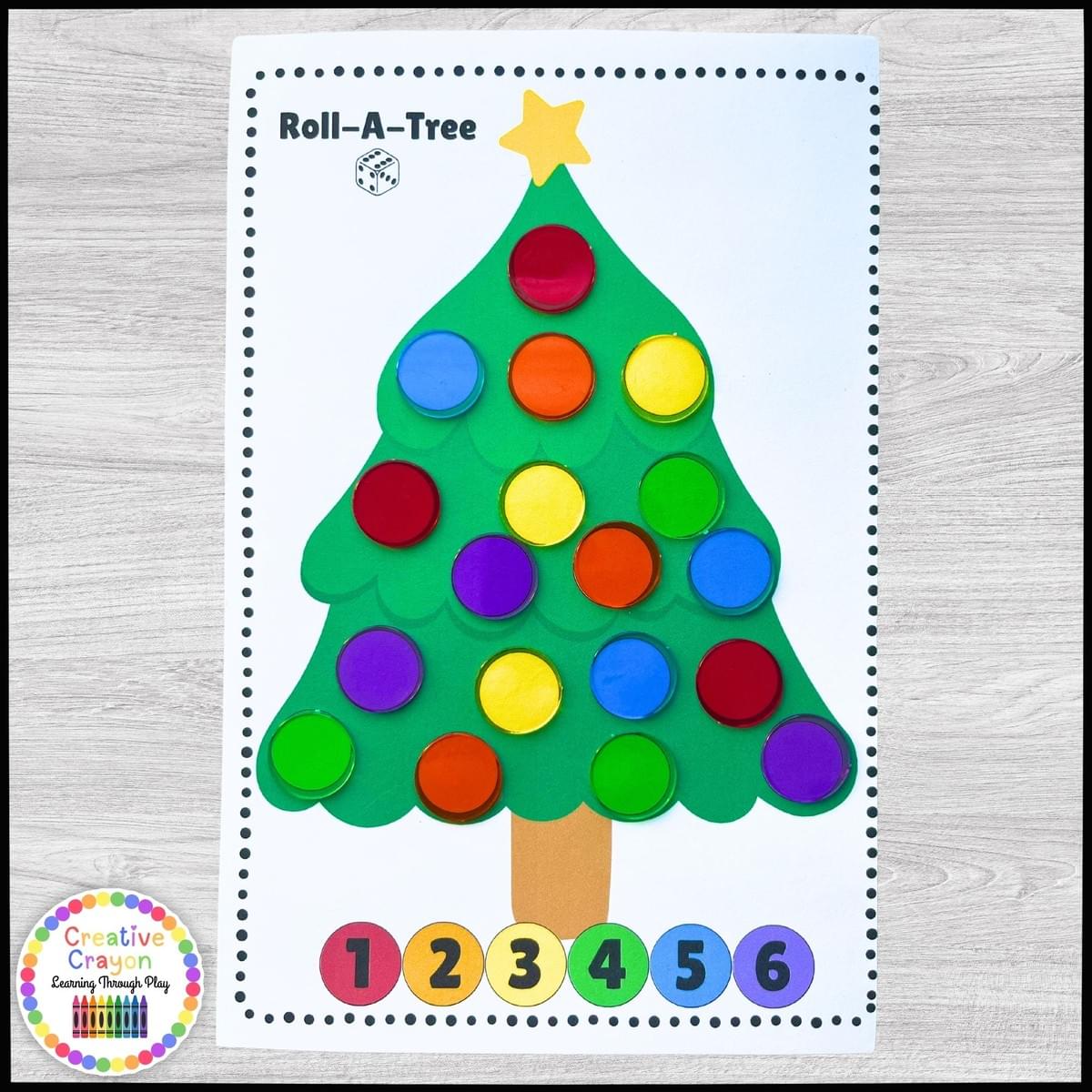Kindergarten math activity where students roll dice and decorate a Christmas tree with bingo chips Kindergarten math activity where students roll dice and decorate a Christmas tree with bingo chips