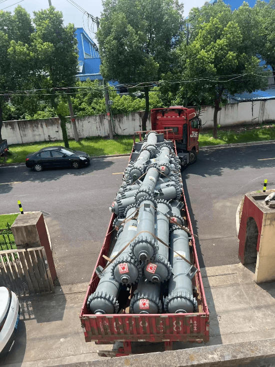 Close-up of glass-lined exchanger with protective sealing before transport. Close-up of glass-lined exchanger with protective sealing before transport.