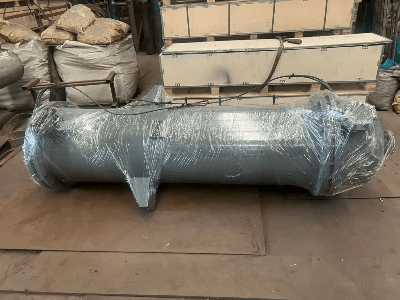 Front view of a 20 m² vertical glass-lined shell-and-tube heat exchanger designed for corrosive chemical and pharmaceutical processes. Front view of a 20 m² vertical glass-lined shell-and-tube heat exchanger designed for corrosive chemical and pharmaceutical processes.