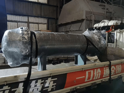 Factory team lifting and securing customized shell-and-tube heat exchangers onto a dedicated truck for safe delivery to the customer site. Factory team lifting and securing customized shell-and-tube heat exchangers onto a dedicated truck for safe delivery to the customer site.