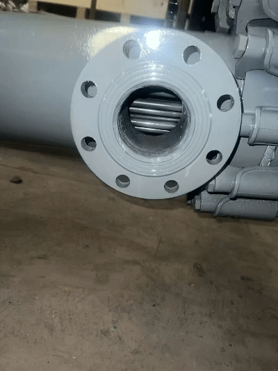 One-piece steel-lined molded PFA tube sheet installed on condenser One-piece steel-lined molded PFA tube sheet installed on condenser