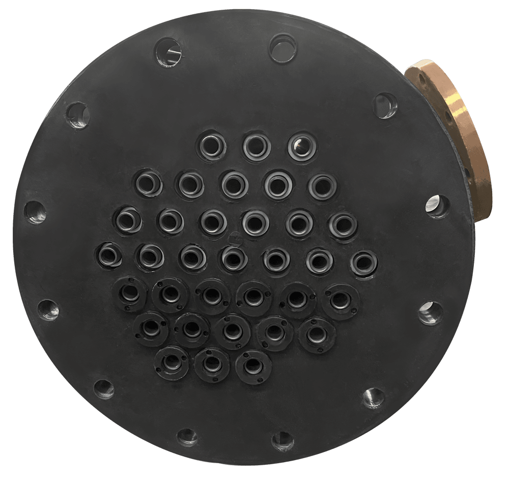 Corrosion-resistant tube sheet for chemical processing heat exchangers Corrosion-resistant tube sheet for chemical processing heat exchangers