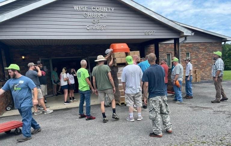 Volunteers assisting with disaster relief efforts outside the Wise County Church of Christ in Wise, Virginia. Volunteers assisting with disaster relief efforts outside the Wise County Church of Christ in Wise, Virginia.