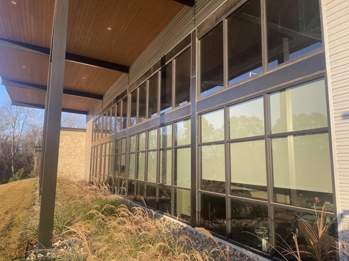 Residential Window Cleaning on a ladder in Tyler Residential Window Cleaning on a ladder in Tyler