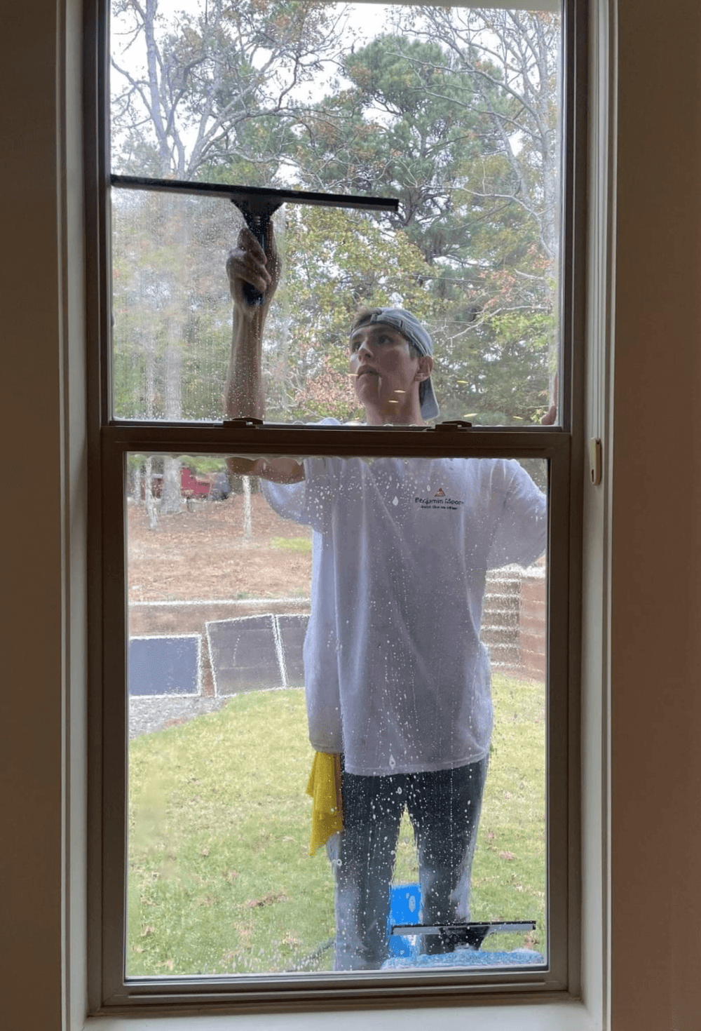 Residential Window Cleaning on a ladder in Tyler Residential Window Cleaning on a ladder in Tyler