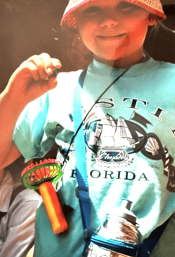 Christian holding a piece of turquoise given to her during a Cathedral Rock hike Christian holding a piece of turquoise given to her during a Cathedral Rock hike