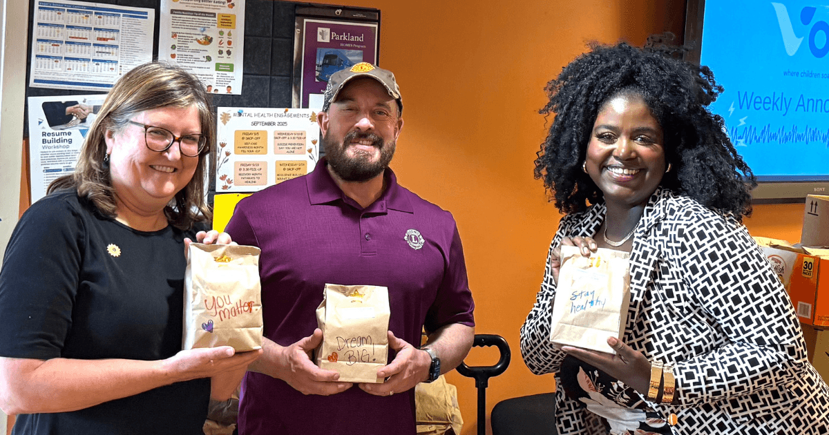 Dallas Founder Lions President Jeff Strater with Vogel Alcove presenting Bye Bye Bags for homeless children in Dallas. Dallas Founder Lions President Jeff Strater with Vogel Alcove presenting Bye Bye Bags for homeless children in Dallas.