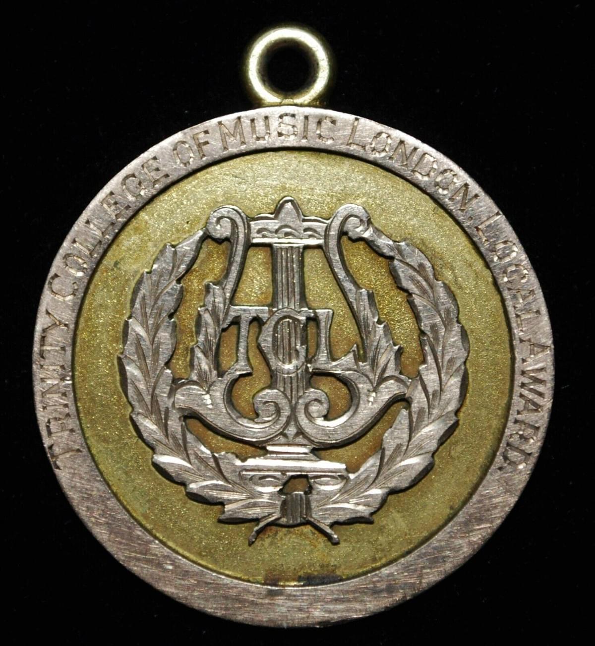 1915 Trinity College of Music, London. 9kt Gold Medal for Piano Forte 1915 Trinity College of Music, London. 9kt Gold Medal for Piano Forte